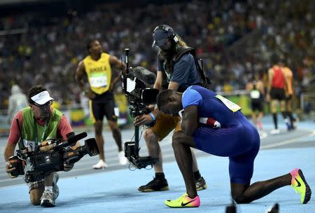 2016 Rio Olympics - Athletics - Final - Men's 100m Final - Olympic Stadium - Rio de Janeiro, Brazil 14/08/2016. Justin Gatlin (USA) of USA reacts after the race REUTERS/Dylan Martinez