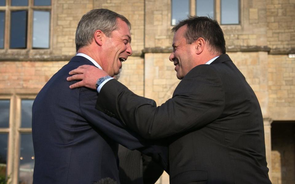 Nigel Farage with Arron Banks - Credit: Matt Cardy/Getty Images