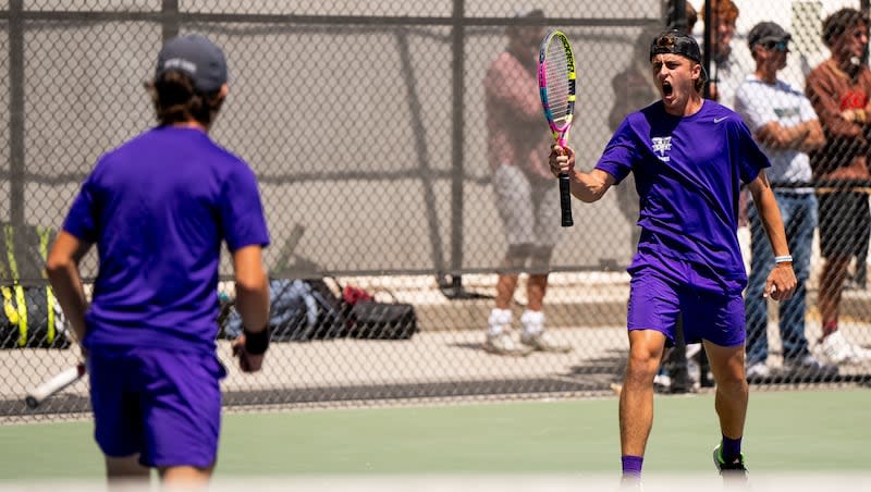 Tyson Wilkins, right, and William Gardner of Desert Hills celebrate a point as they compete against Easton Jenkins and Caleb Xu of Logan in the 4A first doubles match of the UHSAA boys tennis championship at Liberty Park in Salt Lake City on Saturday, May 11, 2024.