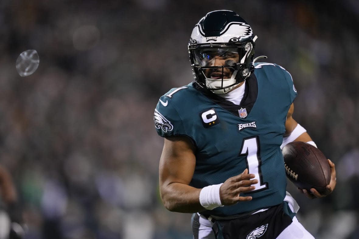 Philadelphia Eagles quarterback Jalen Hurts runs for a touchdown against the New York Giants during the first half of an NFL divisional round playoff football game, Saturday, Jan. 21, 2023, in Philadelphia. (AP Photo/Matt Rourke)