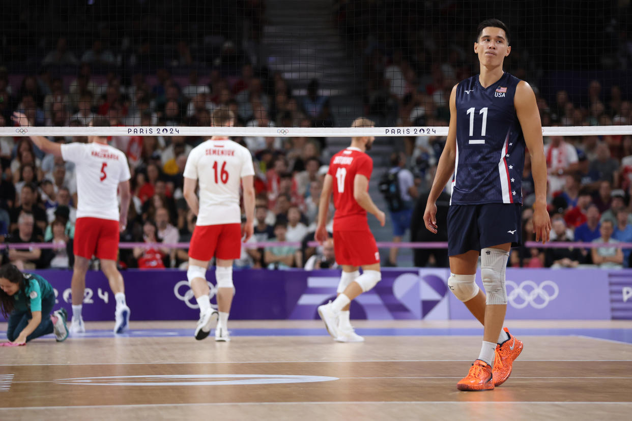 PARIS, FRANCE - AUGUST 07: Micah Christenson #11 of Team United States reacts during a Men's Semifinals match against Team Poland on day twelve of the Olympic Games Paris 2024 at Paris Arena on August 07, 2024 in Paris, France. (Photo by Matthew Stockman/Getty Images)