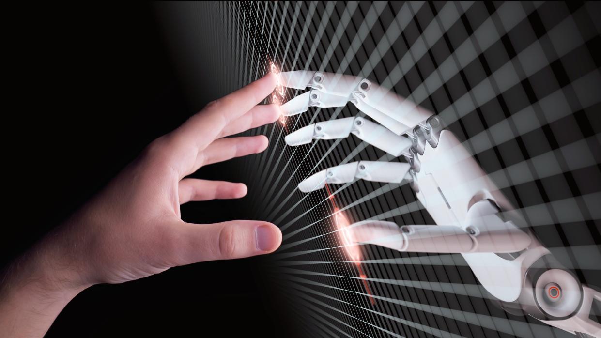  AI robot hand touching human hand 