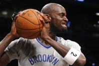 FILE - In this April 11, 2014, file photo, Brooklyn Nets' Kevin Garnett (2) reacts after blocking a shot by Atlanta Hawks' Paul Millsap during the second half of an NBA basketball game in New York. Joining Kobe Bryant as first-time finalists for the Basketball Hall of Fame are: 15-time All-Star Tim Duncan, fellow 15-time All-Star Garnett and 10-time WNBA All-Star and four-time Olympic gold medalist Tamika Catchings. (AP Photo/Jason DeCrow, File)