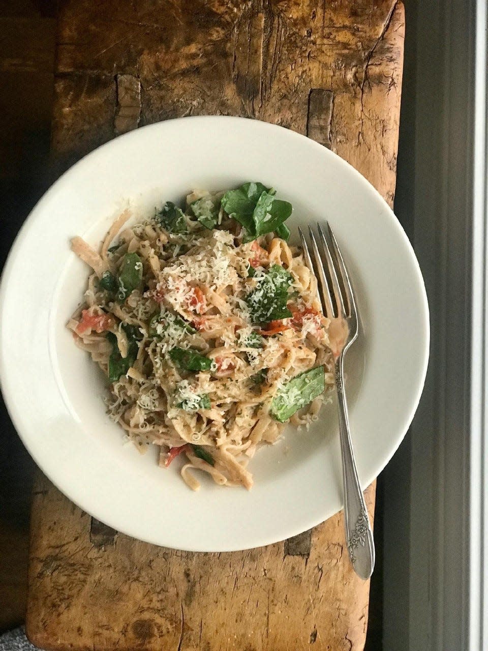 Whole-wheat linguine with spinach, garlic and Parmesan makes a delicious, quick meal.