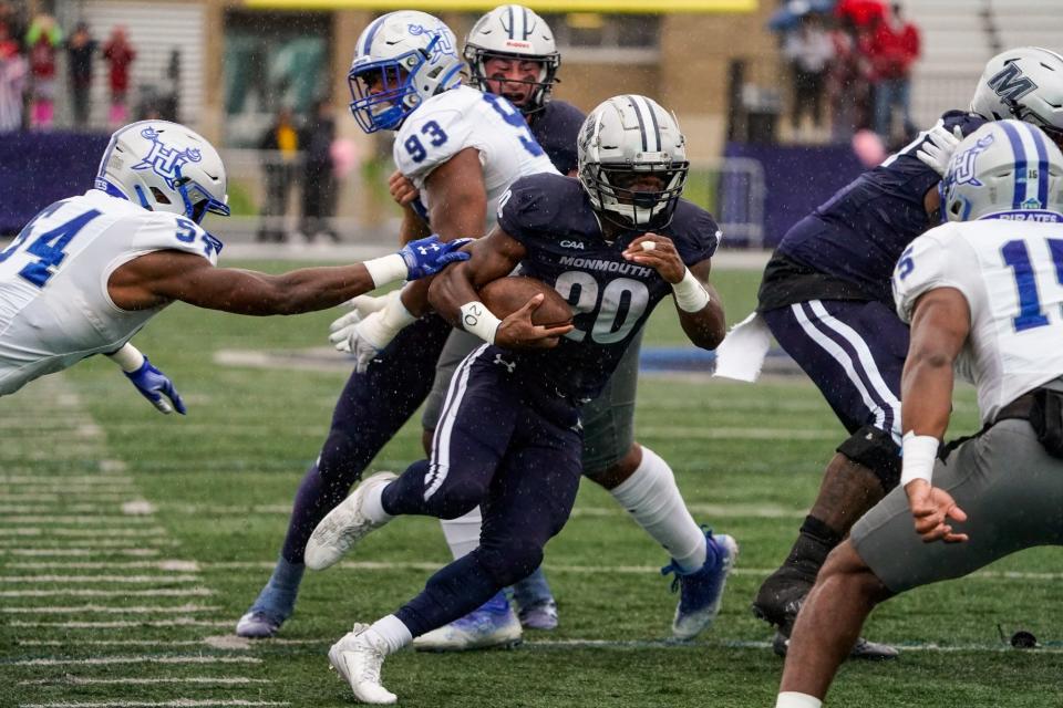 Monmouth running back Jaden Shirden scores on a nine-yard TD run, one of four touchdowns he scored in a 61-10 win over Hampton on Oct. 14, 2023 in West Long Branch, N.J.