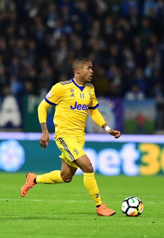 With Neymar out, Brazil coach Tite is entrusting the left wing to Juventus's in-form Douglas Costa