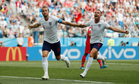 England's Harry Kane celebrates with Jordan Henderson after scoring their second goal. REUTERS/Carlos Barria