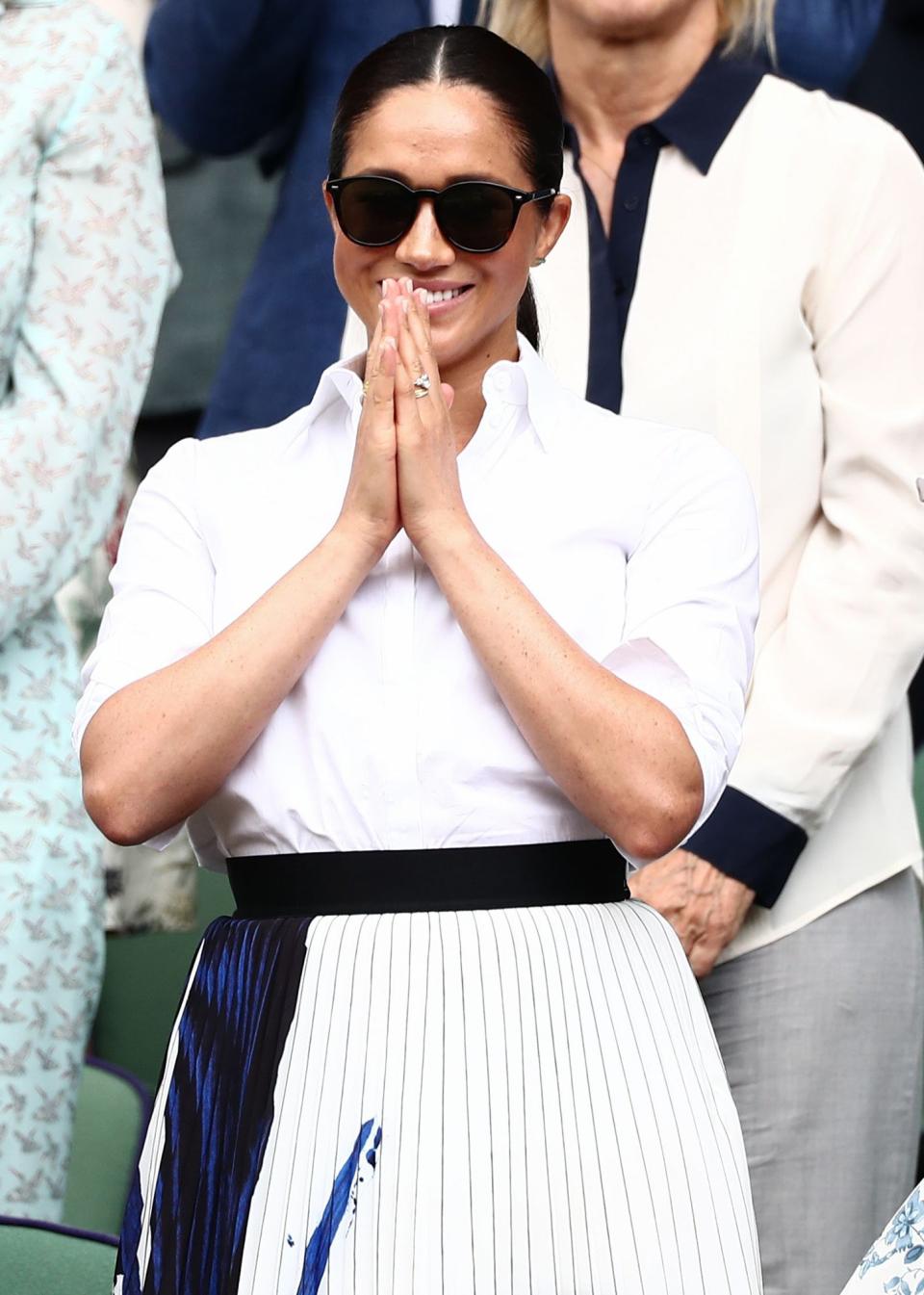 Meghan Markle <a href="https://people.com/royals/meghan-markle-kate-middleton-wimbledon-sisters-in-law-date/" rel="nofollow noopener" target="_blank" data-ylk="slk:attended at the Ladies’ Singles Final at Wimbledon;elm:context_link;itc:0;sec:content-canvas" class="link ">attended at the Ladies’ Singles Final at Wimbledon</a> with Kate Middleton and Pippa Middleton wearing a white button-down shirt which she paired with a pleated white and blue skirt from Hugo Boss. <strong>Get the Look!</strong> Howriis Women's Summer Chiffon Pleated A-line Midi Skirt Dress, $27.99; <a href="https://www.amazon.com/Howriis-Womens-Summer-Chiffon-Pleated/dp/B07PVS1T53/ref=as_li_ss_tl?keywords=pleated+white+midi+skirt&qid=1563386902&s=gateway&sr=8-20-spons&psc=1&linkCode=ll1&tag=poamzfmeghanmarklesummerstyle2019kphillips0719-20&linkId=30807c82430730807b5c8a0553586558&language=en_US" rel="nofollow noopener" target="_blank" data-ylk="slk:amazon.com;elm:context_link;itc:0;sec:content-canvas" class="link ">amazon.com</a> Chelsea28 Stripe Wrap Skirt, $47.40 (orig. $79); <a href="https://click.linksynergy.com/deeplink?id=93xLBvPhAeE&mid=1237&murl=https%3A%2F%2Fshop.nordstrom.com%2Fs%2Fchelsea28-stripe-wrap-skirt%2F5135989&u1=PEO%2CShopping%3AEverythingYouNeedtoCopyMeghanMarkle%27sChicSummerStyle%2Ckamiphillips2%2CUnc%2CGal%2C6939680%2C201909%2CI" rel="nofollow noopener" target="_blank" data-ylk="slk:nordstrom.com;elm:context_link;itc:0;sec:content-canvas" class="link ">nordstrom.com</a> Max Studio Pleated Striped Midi Skirt, $48.30 (orig. $69); <a href="https://click.linksynergy.com/deeplink?id=93xLBvPhAeE&mid=36025&murl=https%3A%2F%2Fwww.lastcall.com%2FMax-Studio-Pleated-Striped-Midi-Skirt-pleated-midi-skirt%2Fprod53940361___%2Fp.prod&u1=PEO%2CShopping%3AEverythingYouNeedtoCopyMeghanMarkle%27sChicSummerStyle%2Ckamiphillips2%2CUnc%2CGal%2C6939680%2C201909%2CI" rel="nofollow noopener" target="_blank" data-ylk="slk:lastcall.com;elm:context_link;itc:0;sec:content-canvas" class="link ">lastcall.com</a> BCBGMAXAZRIA Two-Tone Pleated Midi Skirt, $139.30 (orig. $199); <a href="https://click.linksynergy.com/deeplink?id=93xLBvPhAeE&mid=36025&murl=https%3A%2F%2Fwww.lastcall.com%2FBCBGMAXAZRIA-Two-Tone-Pleated-Midi-Skirt-pleated-midi-skirt%2Fprod54200885___%2Fp.prod&u1=PEO%2CShopping%3AEverythingYouNeedtoCopyMeghanMarkle%27sChicSummerStyle%2Ckamiphillips2%2CUnc%2CGal%2C6939680%2C201909%2CI" rel="nofollow noopener" target="_blank" data-ylk="slk:lastcall.com;elm:context_link;itc:0;sec:content-canvas" class="link ">lastcall.com</a> REISS Leona Floral Midi Skirt, $145 (orig. $295); <a href="https://click.linksynergy.com/deeplink?id=93xLBvPhAeE&mid=13867&murl=https%3A%2F%2Fwww.bloomingdales.com%2Fshop%2Fproduct%2Freiss-leona-floral-midi-skirt%3FID%3D3332036&u1=PEO%2CShopping%3AEverythingYouNeedtoCopyMeghanMarkle%27sChicSummerStyle%2Ckamiphillips2%2CUnc%2CGal%2C6939680%2C201909%2CI" rel="nofollow noopener" target="_blank" data-ylk="slk:bloomingdales.com;elm:context_link;itc:0;sec:content-canvas" class="link ">bloomingdales.com</a> Club Monaco Majida Skirt, $139 (orig. $179.50); <a href="https://click.linksynergy.com/deeplink?id=93xLBvPhAeE&mid=37811&murl=https%3A%2F%2Fwww.clubmonaco.com%2Fen%2Fwomen-clothing-skirts%2Fmajida-skirt%2F484553.html&u1=PEO%2CShopping%3AEverythingYouNeedtoCopyMeghanMarkle%27sChicSummerStyle%2Ckamiphillips2%2CUnc%2CGal%2C6939680%2C201909%2CI" rel="nofollow noopener" target="_blank" data-ylk="slk:clubmonaco.com;elm:context_link;itc:0;sec:content-canvas" class="link ">clubmonaco.com</a>