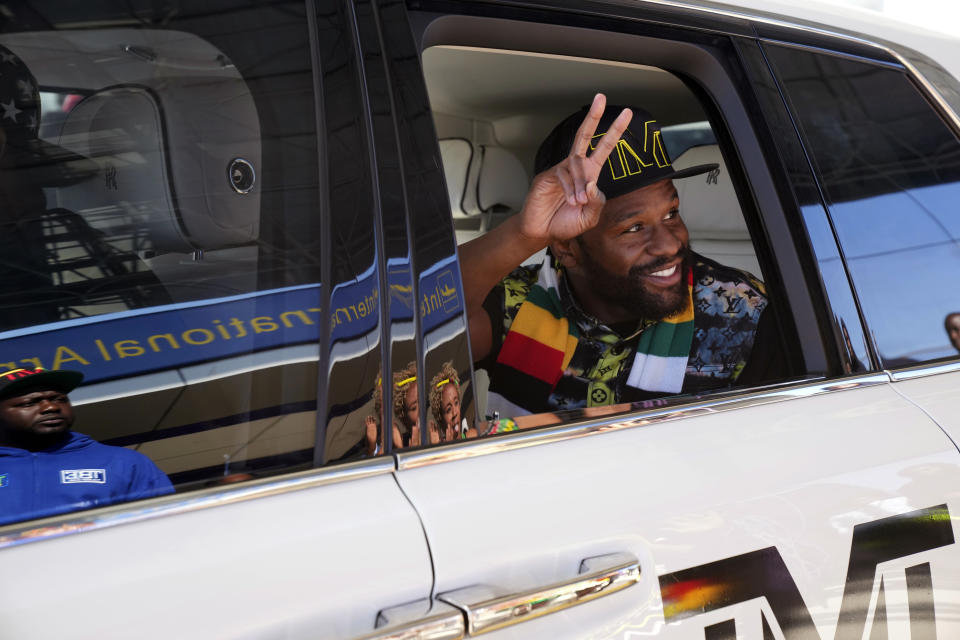 U.S boxing promoter and former professional boxer Floyd Joy Mayweather is seen upon arrival at Robert Mugabe airport in Harare, Zimbabwe, Thursday, July 13 2023. Mayweather is in the country for what he is calling the Motherland Tour. (AP Photo/Tsvangirayi Mukwazhi)