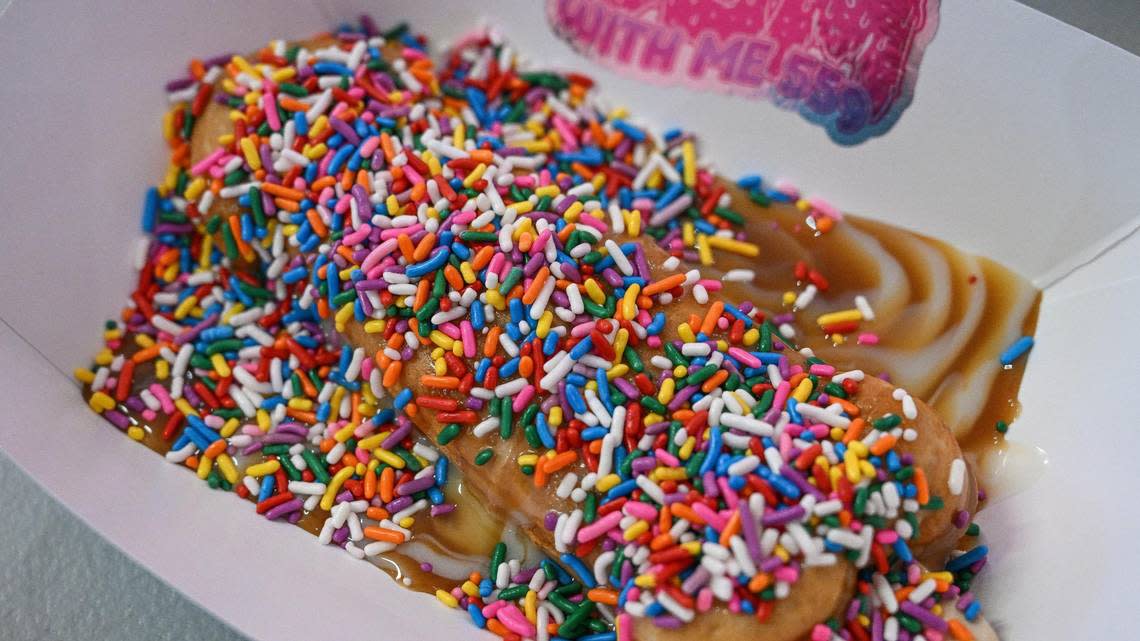 A pancake is covered in sprinkles and syrup at an X-rated bakery in the Tower District on Tuesday, July 18, 2023.