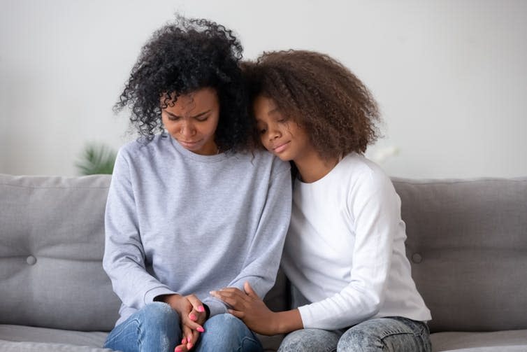 <span class="caption">At times, life can be challenging for military families.</span> <span class="attribution"><a class="link " href="https://www.shutterstock.com/image-photo/sad-african-daughter-mother-sitting-on-1332865535?src=iUTPe_QTiaQpNIYTMNyzCw-1-6" rel="nofollow noopener" target="_blank" data-ylk="slk:Shutterstock/fizkes;elm:context_link;itc:0;sec:content-canvas">Shutterstock/fizkes</a></span>