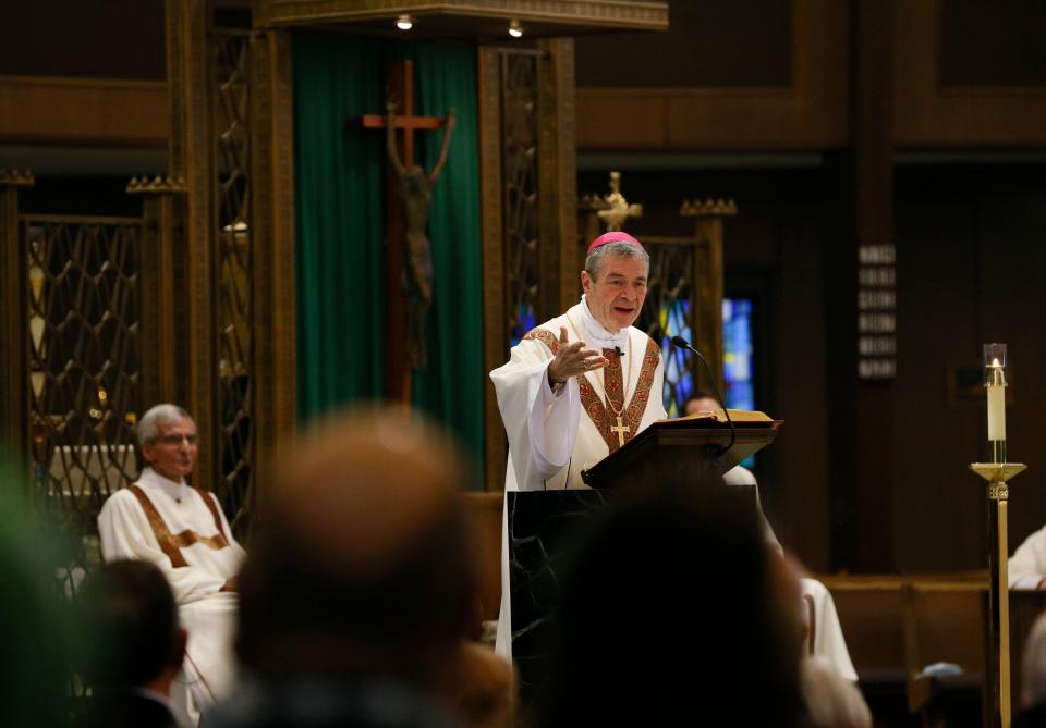 Bishop Robert J Brennan gives the homily during one of his last masses in Columbus at Christ the King Catholic Church in Columbus, Ohio, on Sunday, Nov. 21, 2021. Brennan was reassigned to be the new Bishop of Brooklyn. “We live our lives just as Jesus did so we can see Christ here on the east side of Columbus,” said Brennan.