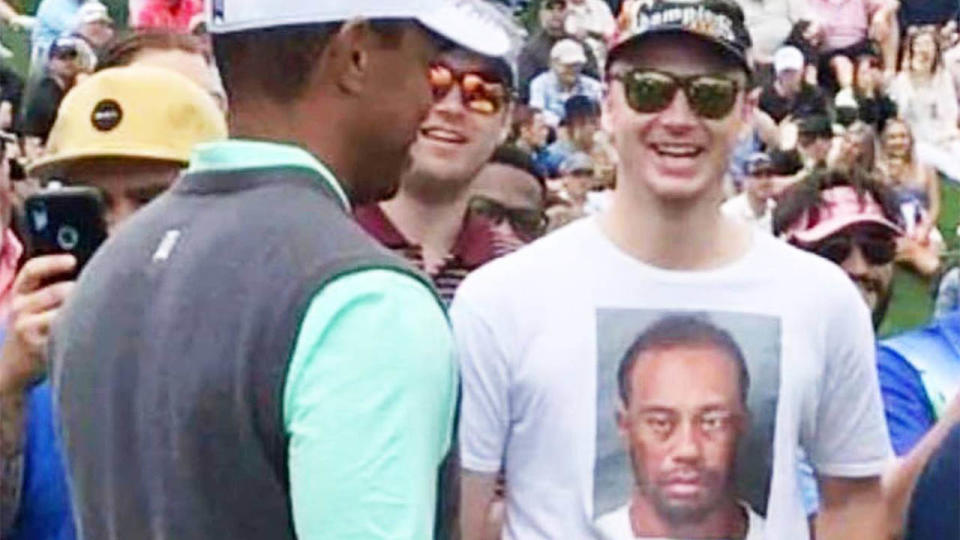 Tiger Woods laughing at Thomas Wesling’s t-shirt. (Instagram: @dad_bod_tom)