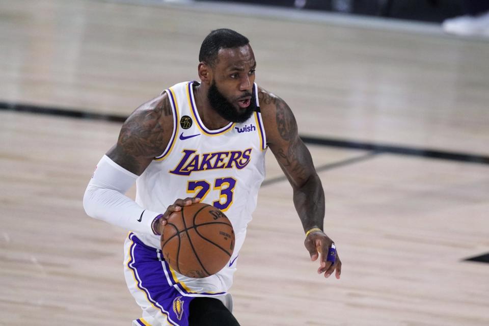 Lakers forward LeBron James controls the ball during Game 3.
