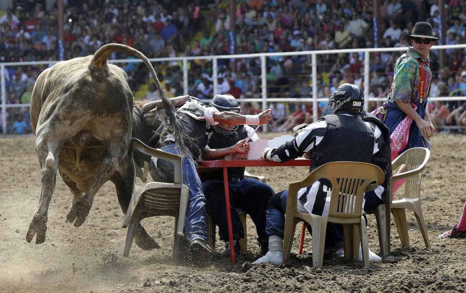 Inmates participate in the Angola Prison Rodeo in Angola, La., Saturday, April 26, 2014. Louisiana’s most violent criminals, many serving life sentences for murder, are the stars of the Angola Prison Rodeo, the nation’s longest-running prison rodeo that this year celebrates 50 years. The event has grown from a small “fun” event for prisoners into big business, with proceeds going into the Louisiana State Penitentiary Inmate Welfare Fund for inmate education and recreational supplies. (AP Photo/Gerald Herbert)