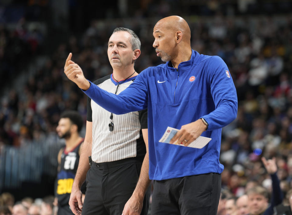 Detroit Pistons head coach Monty Williams, right, argues for a call with referee Brett Nansel in the first half of an NBA basketball game against the Denver Nuggets, Sunday, Jan. 7, 2024, in Denver. (AP Photo/David Zalubowski)