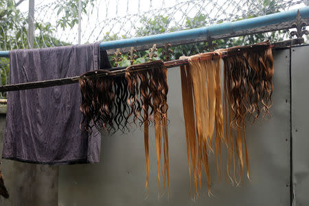 The hair processed for export are seen at Tet Nay Lin Trading Co. in Yangon, Myanmar, June 19, 2018. Picture taken June 19, 2018. REUTERS/Ann Wang