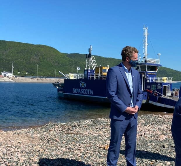 Premier Iain Rankin made the announcement at the Englishtown ferry terminal in Victoria County on Saturday. (Matthew Moore/CBC - image credit)