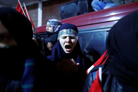 Demonstrators pray during a protest against U.S. President Donald Trump's decision that the United States recognizes Jerusalem as the capital of Israel, near the U.S. Consulate in Istanbul, Turkey, December 6, 2017. REUTERS/Osman Orsal