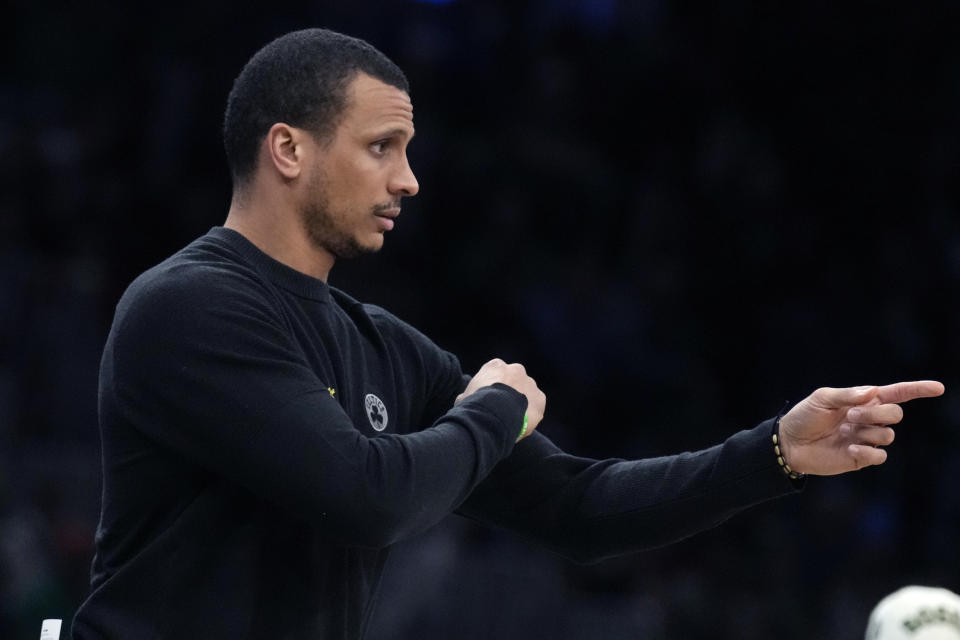 Boston Celtics coach Joe Mazzulla calls to players during the first half of the team's NBA basketball game against the Atlanta Hawks, Wednesday, Feb. 7, 2024, in Boston. (AP Photo/Charles Krupa)