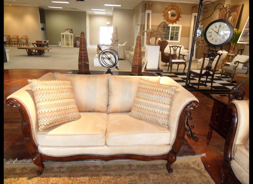 This is one of those side-of-the-road finds that Jeanne and Faye couldn't leave behind. This love seat, along with a matching nine-foot coach were left out on the lawn. After a little love and attention, it's ready for a new home.