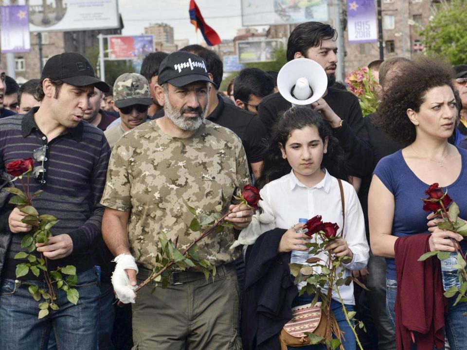 Armenian protest leader Nikol Pashinyan (second left) leads a march to the monument to the victims of the 1915 massacres in Yerevan (Tigran Mehrabyan/PAN Photo via AP)