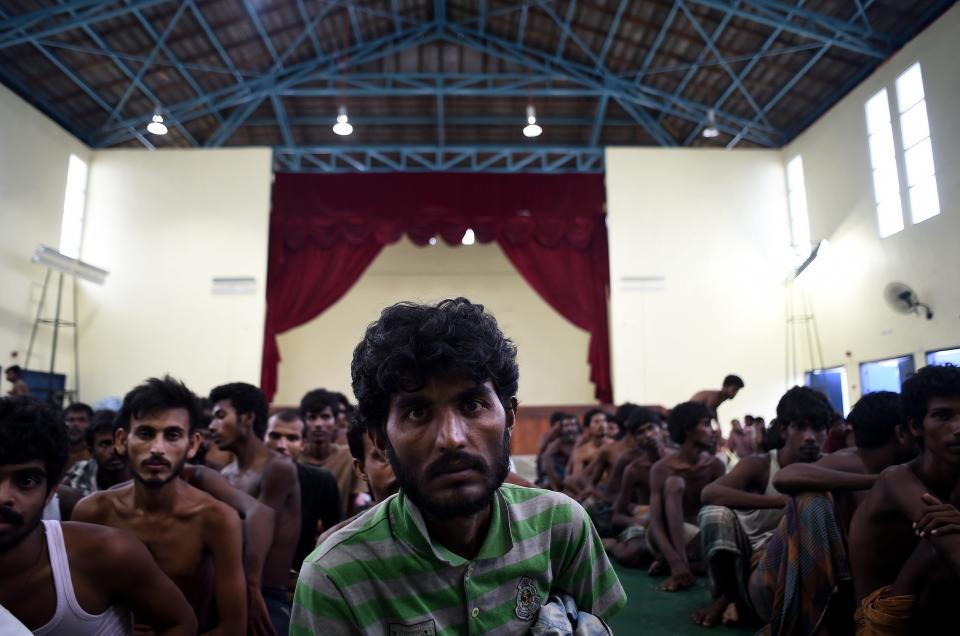 Bangladeshi migrant waits at the Police headquarters in Langkawi on May 11, 2015 after landing on Malaysian shores earlier in the day. (Photo credit should read MANAN VATSYAYANA/AFP/Getty Images)