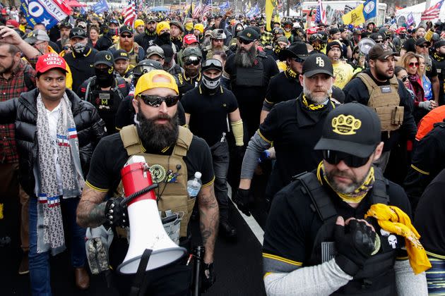 FILE - Proud Boys member Jeremy Joseph Bertino, second from left, joins other supporters of President Donald Trump who are wearing attire associated with the Proud Boys as they attend a rally at Freedom Plaza, Dec. 12, 2020, in Washington. Bertino told jurors on Tuesday, Feb. 21, 2023, that he viewed their far-right extremist organization as 