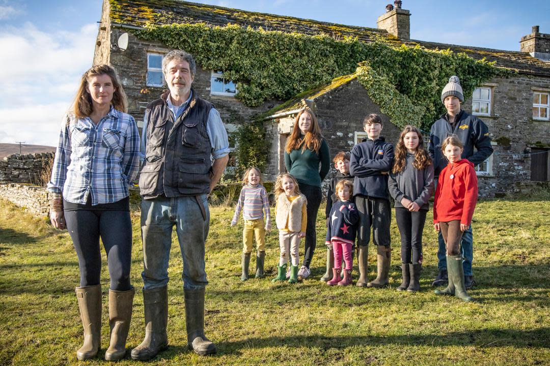 Our Yorkshire Farm
Contributors Amanda and Clive Owen with their children Annas, Violet, Edith, Raven, Clemmy, Nancy, Reuben, Miles, and Sidney outside on Ravenseat Farm.
