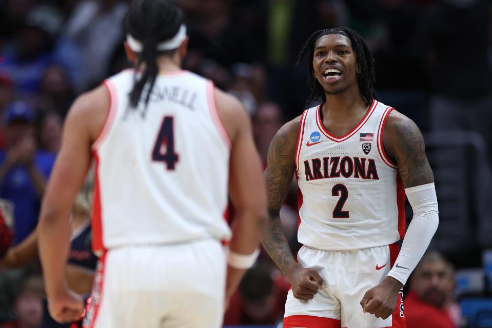 Caleb Love #2 of the Arizona Wildcats reacts with his teammate Kylan Boswell #4 in a game against the Clemson Tigers during the second half in the Sweet 16 round of the NCAA Men's Basketball Tournament at Crypto.com Arena on March 28, 2024 in Los Angeles Angels.