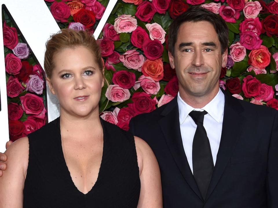 Amy Schumer and Chris Fischer