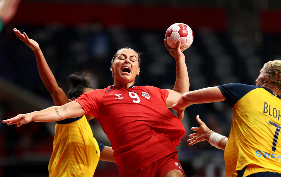 <p>Nora Moerk of Team Norway shoots at goal while being challenged by Linn Blohm of Team Sweden during the Women's Bronze Medal handball match between Norway and Sweden on day sixteen of the Tokyo 2020 Olympic Games at Yoyogi National Stadium on August 08, 2021 in Tokyo, Japan. (Photo by Maja Hitij/Getty Images)</p> 