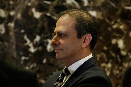 Preet Bharara, the U.S. Attorney for the Southern District of New York stands by the elevators upon his arrival at Trump Tower to meet with U.S. President-elect Donald Trump in New York, U.S., November 30, 2016. REUTERS/Mike Segar