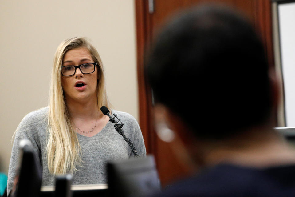 Former gymnast and victim Kamerin Moore speaks at the sentencing hearing for Larry Nassar, (R) a former team USA Gymnastics doctor who pleaded guilty in November 2017 to sexual assault charges, in Lansing, Michigan, U.S., January 22, 2018. REUTERS/Brendan McDermid