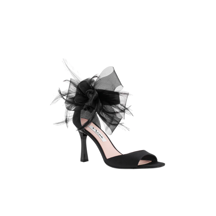 <p><a href="https://go.redirectingat.com?id=74968X1596630&url=https%3A%2F%2Fwww.ninashoes.com%2Fproducts%2Fdora-black-luster-satin&sref=https%3A%2F%2F" rel="nofollow noopener" target="_blank" data-ylk="slk:Shop Now;elm:context_link;itc:0;sec:content-canvas" class="link ">Shop Now</a></p><p>Dora Black Bow, Feather and Flower Heels</p><p>$64.50</p><p>ninashoes.com</p><span class="copyright">Nina</span>