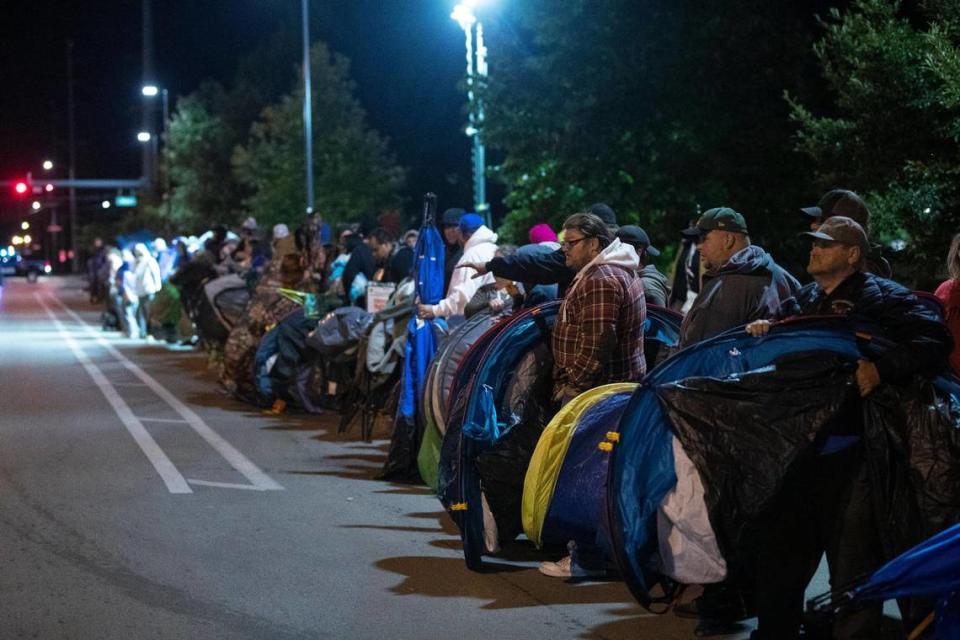 Fans gather across the street from Memorial Coliseum for the Big Blue Madness campout before claiming their spots at 5 a.m. Saturday. Silas Walker/swalker@herald-leader.com