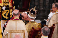 <p>LONDON, ENGLAND - MAY 06: Prince William, Prince of Wales kisses his father, King Charles III, wearing St Edward's Crown, during the King's Coronation Ceremony inside Westminster Abbey on May 6, 2023 in London, England. The Coronation of Charles III and his wife, Camilla, as King and Queen of the United Kingdom of Great Britain and Northern Ireland, and the other Commonwealth realms takes place at Westminster Abbey today. Charles acceded to the throne on 8 September 2022, upon the death of his mother, Elizabeth II. (Photo by Yui Mok - WPA Pool/Getty Images)</p> 