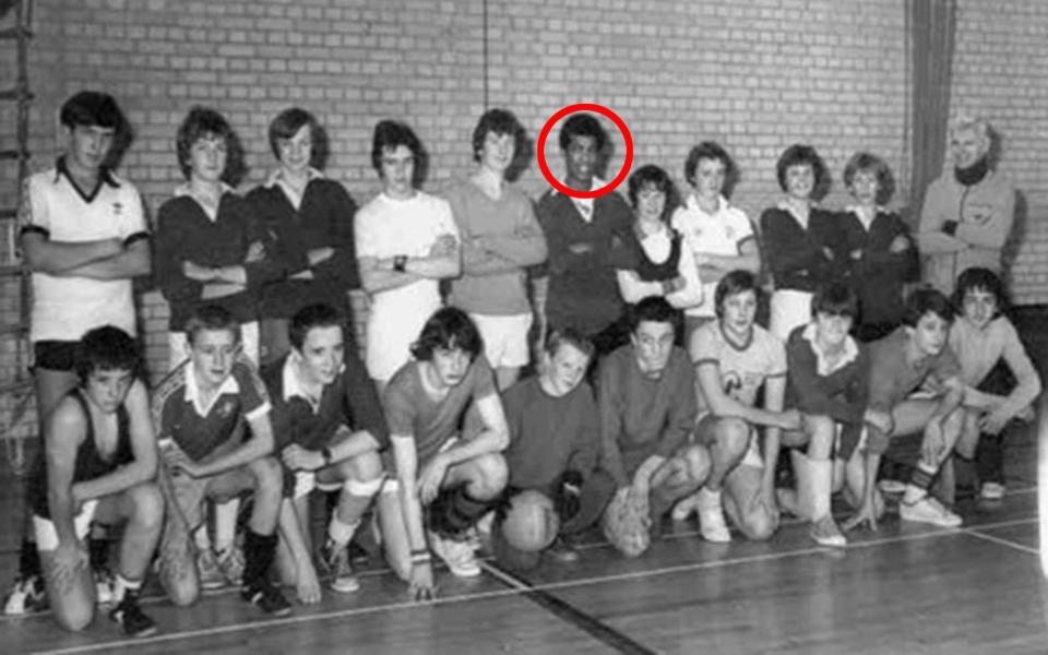 Adrian Ajao (circled) is photographed with school friends who were taking part in a charity five-a-side tournament