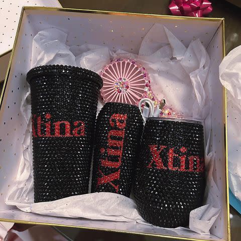 <p>Christina Aguilera/Instagram </p> Christina Aguilera posts some blinged out cups on Instagram as part of a behind-the-scenes post from her 43rd birthday celebrations