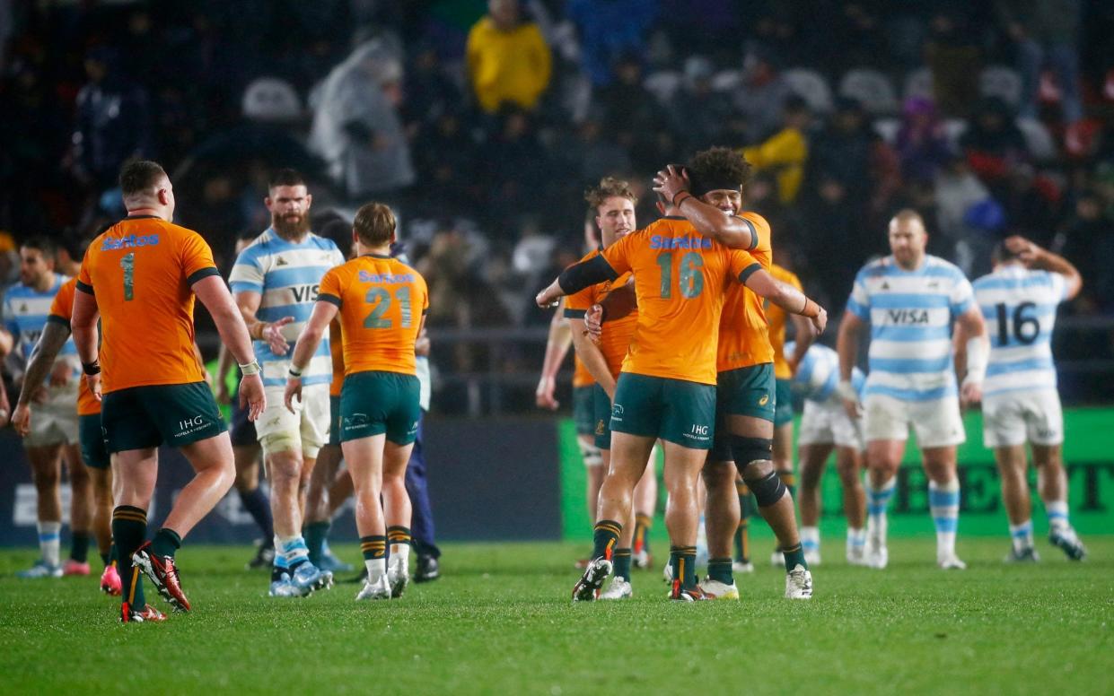 Australia's players celebrate a first Rugby Championship win since 2022