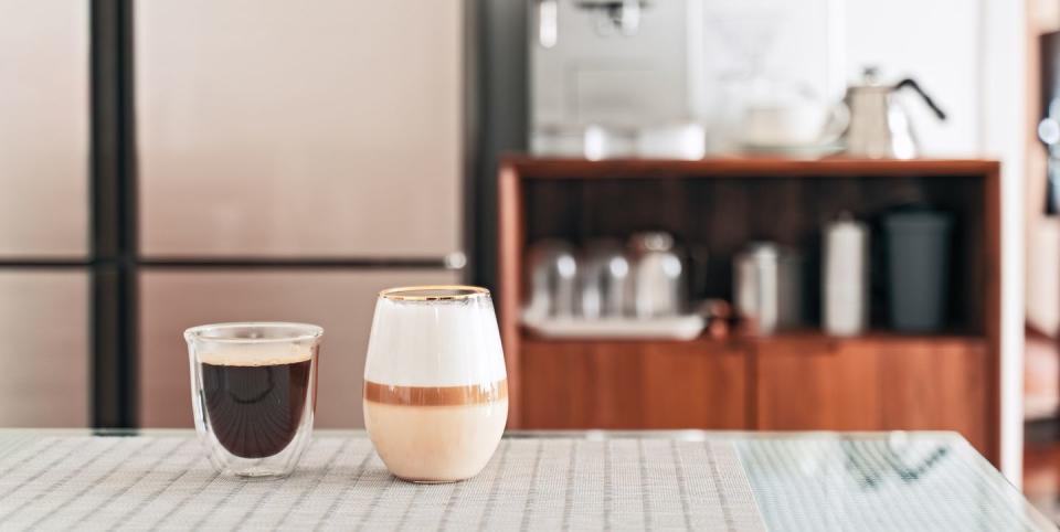 homemade americano and macchiato coffee on table