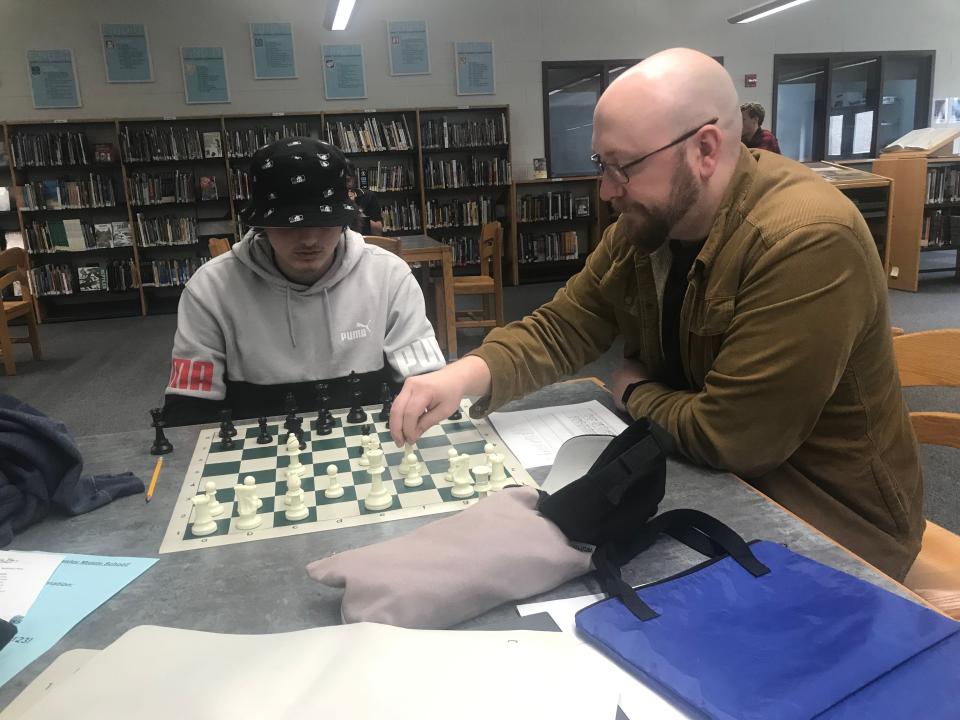 Claude Fried, right, a 33-year-old chess player from Dover, recently crossed the 2,000 rating barrier, putting him in the U.S. Chess Federation’s Expert category and the top 2.9% of players in the country.