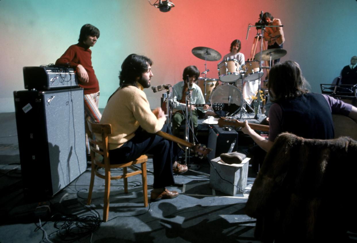 Paul McCartney (from left, seated), George Harrison, Ringo Starr and John Lennon begin the work of roughing out The Beatles' "Let It Be" in Twickenham Studios.