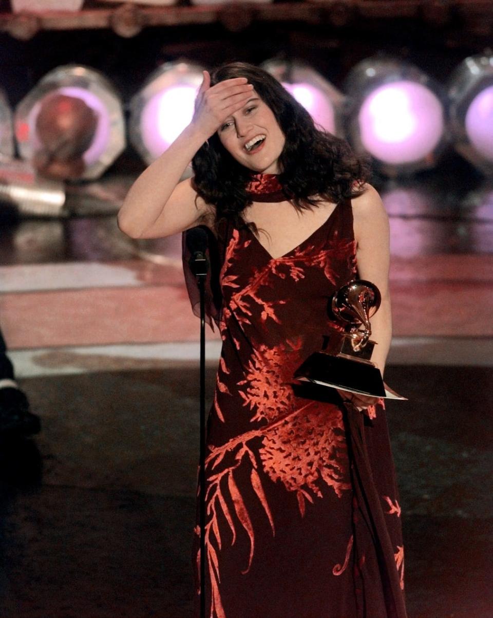 Paula Cole reacts to her Grammy for best new artist at the 40th annual Grammy Awards at New York's Radio City Music Hall in 1998.