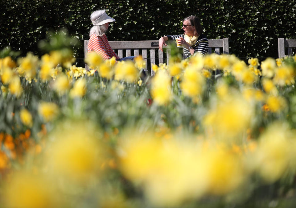 Visitors enjoying the sun at Kew Gardens in south-west London. Picture date: Tuesday March 30, 2021. Temperatures in parts of the UK are expected to be significantly warmer this week as families and friends are reunited and sporting activities are allowed to resume in England.