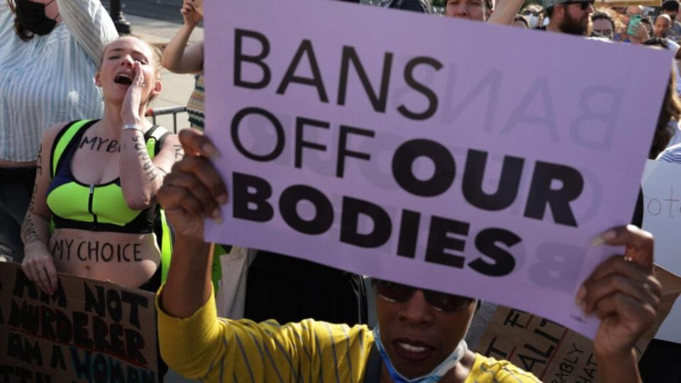 Pro-choice activists protest during a rally in front of the U.S. Supreme Court in response to the leaked Supreme Court draft decision to overturn Roe v. Wade May 3, 2022 in Washington, DC. (Photo by Alex Wong/Getty Images)