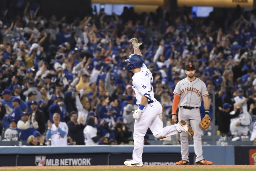 Los Angeles, CA - October 12: Los Angeles Dodgers' Will Smith rounds the bases after a two-run home run during the eighth inning in game four of the 2021 National League Division Series against the San Francisco Giants at Dodger Stadium on Tuesday, Oct. 12, 2021 in Los Angeles, CA. (Wally Skalij / Los Angeles Times)