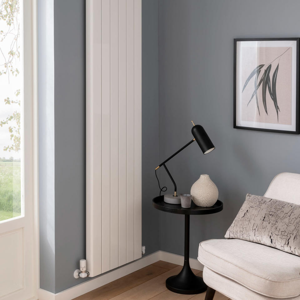 tall wall radiator in grey living room