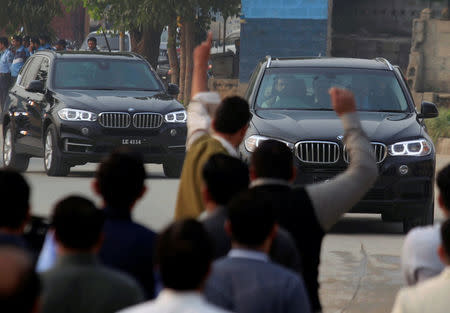 A car transports Pakistan's former Prime Minister Nawaz Sharif as he arrives to appear before the accountability court to face the corruption charges filed against him, in Islamabad, Pakistan November 3, 2017. REUTERS/Faisal Mahmood