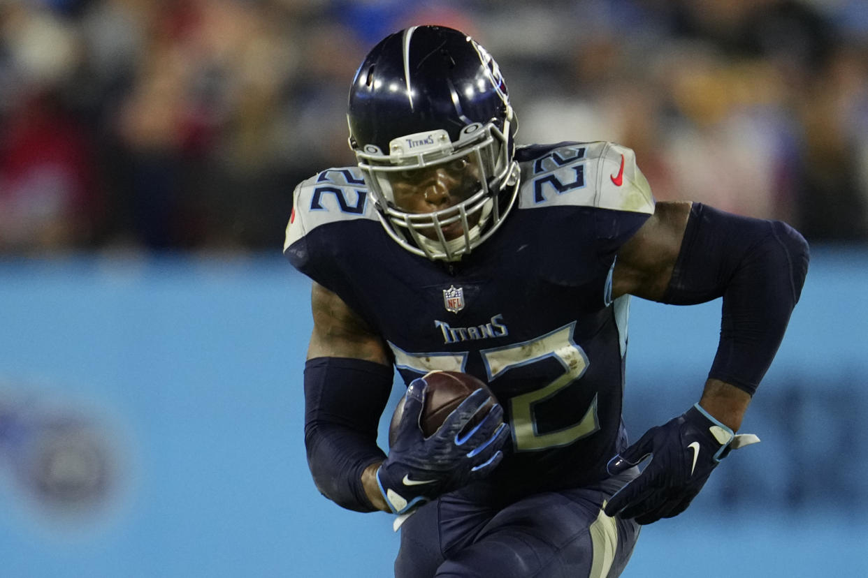 NASHVILLE, TENNESSEE - OCTOBER 18: Derrick Henry #22 of the Tennessee Titans runs during to an NFL game against the Buffalo Bills at Nissan Stadium on October 18, 2021 in Nashville, Tennessee. (Photo by Cooper Neill/Getty Images)